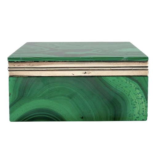 12 - A silver mounted rectangular malachite hinged box. The mounts marked for Geo Betjemann & Sons Ltd, L... 