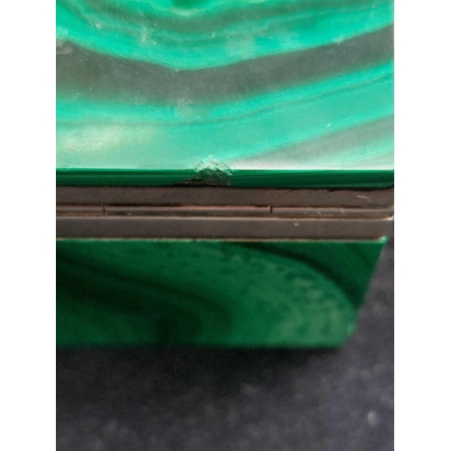 12 - A silver mounted rectangular malachite hinged box. The mounts marked for Geo Betjemann & Sons Ltd, L... 