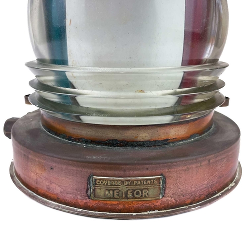 120 - A Meteor copper ship's lamp. With lens coloured for Port and Starboard, height 38.5cm. There is gene... 