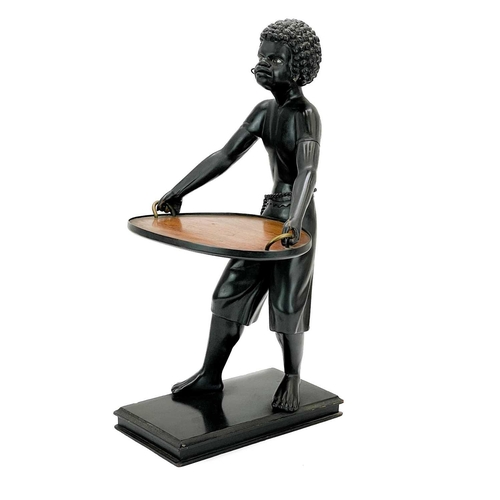 125 - A carved ebony table waiter. 19th century, the figure holding a tray, on a rectangular base, height ... 