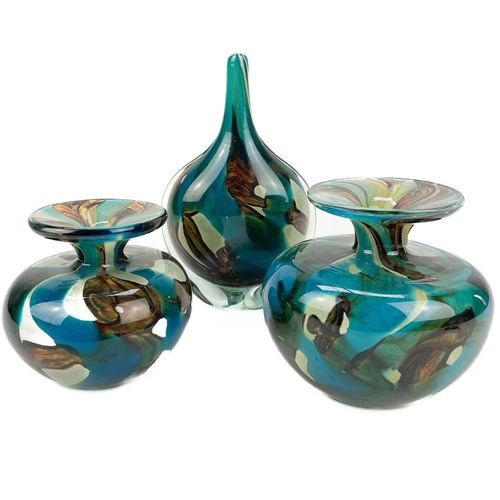 131 - A Mdina glass bottle vase. With applied drop base, height 20cm, together with two other pieces of Md... 