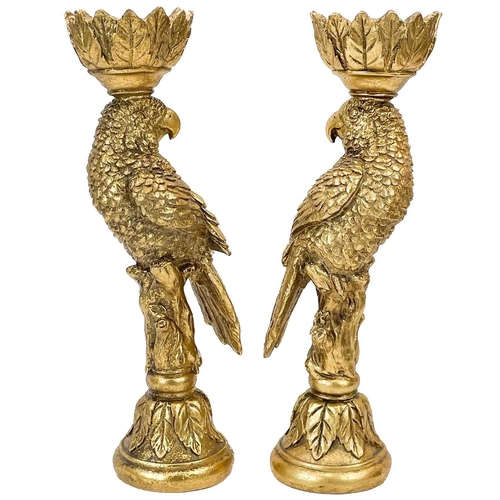 132 - A pair of gilt resin parrot candlesticks. Height 34cm.