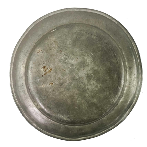 140 - A pewter plate marked 1759 inscribed with the owner's initials. Diameter - 22.5cm together with two ... 