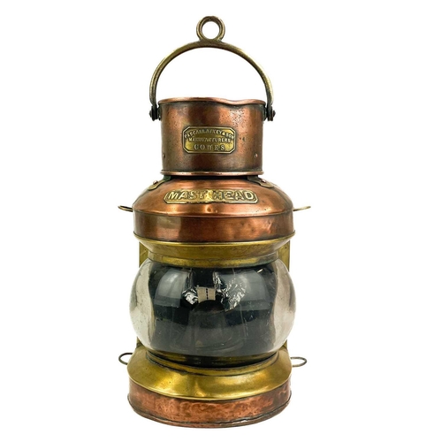 144 - A ship's copper mast head lamp. By Pascall Atkey & Son, Manufacturers, Cowes, with oil burner, heigh... 