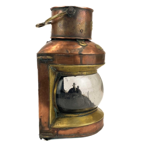 144 - A ship's copper mast head lamp. By Pascall Atkey & Son, Manufacturers, Cowes, with oil burner, heigh... 