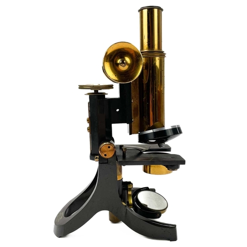 149 - A Swift & Son brass and lacquered microscope. With rack and pinion focus, stamped 81, Tottenham Crt ... 