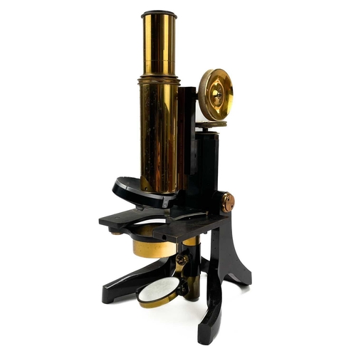 149 - A Swift & Son brass and lacquered microscope. With rack and pinion focus, stamped 81, Tottenham Crt ... 