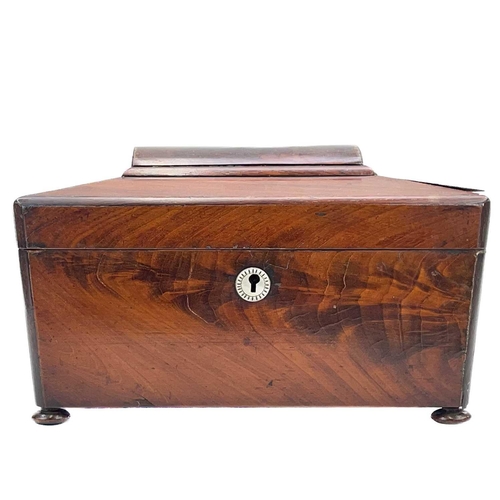 150 - A Victorian mahogany tea caddy. With a domed top and two internal lidded compartments, on disc feet,... 