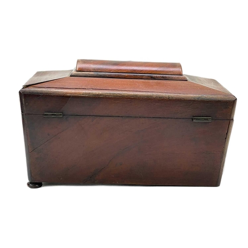 150 - A Victorian mahogany tea caddy. With a domed top and two internal lidded compartments, on disc feet,... 