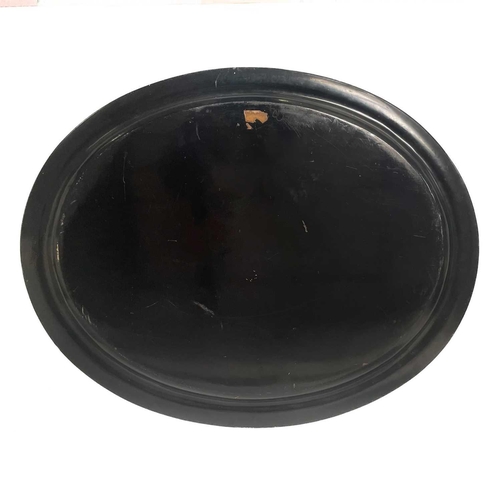 153 - A Victorian black lacquered papier-mâché mache oval tray. Painted with a central floral bouquet with... 