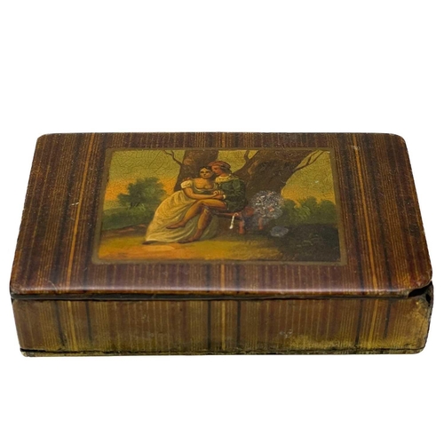 170 - A Victorian papier-mâché snuff box. Decorated lovers in a landscape, width 9cm, together with a clay... 