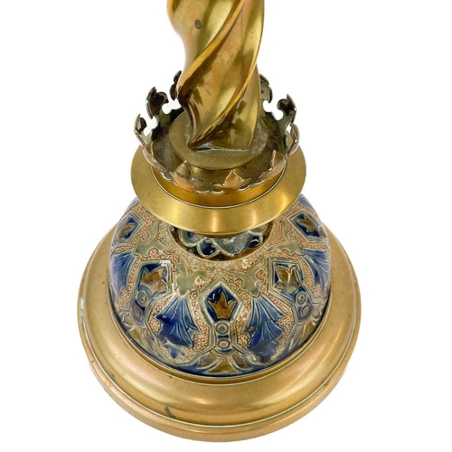 176 - A Victorian brass oil lamp with a ceramic and glass oil reservoir and clear glass shade. With painte... 