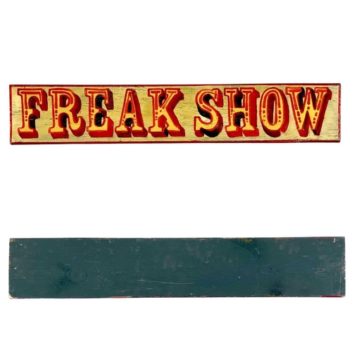 178 - A hand-painted freak show sign. On wooden board, 19cm x 106cm.