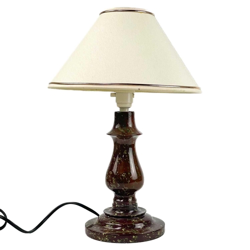 182 - A Cornish serpentine baluster turned table lamp. Height 22cm (excluding electrical fittings).