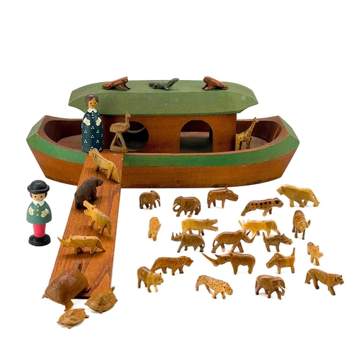 185 - Noah's Ark with various African wood carved animals. Height 16cm width 41cm depth 16.5cm.