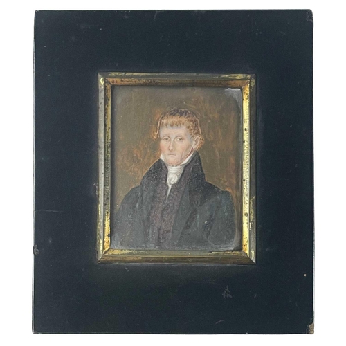 193 - A small Georgian miniature of a gentleman. 7.2X5.6cm, in an ebonised frame.