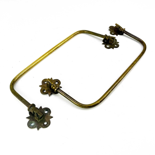 198 - A pair of Victorian brass rails. Width 32cm, and four window casement stays.