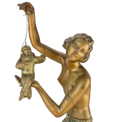 199 - A French Art Deco table lamp. With a bronzed spelter female dancer holding a marionette of Pierrot s... 