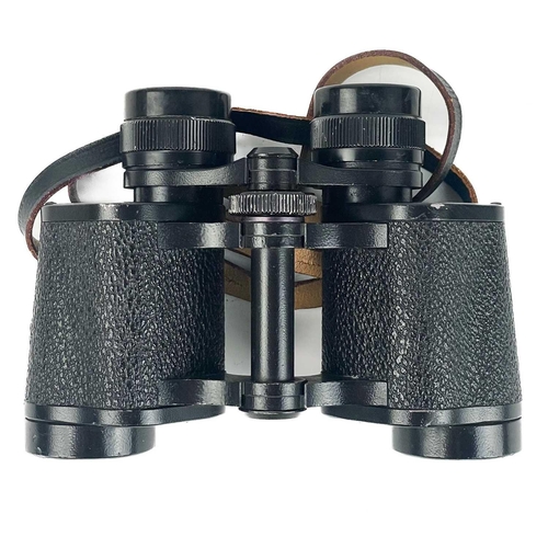 203 - A pair of Zeiss 8 X 30 binoculars. In leather carry case.