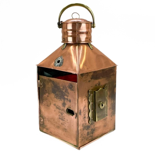 207 - A copper and brass mast lamp. PORT, height 50cm width 36cm.