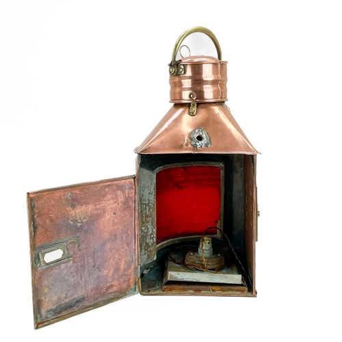 207 - A copper and brass mast lamp. PORT, height 50cm width 36cm.