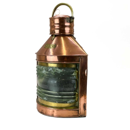 207 - A copper and brass mast lamp. PORT, height 50cm width 36cm.