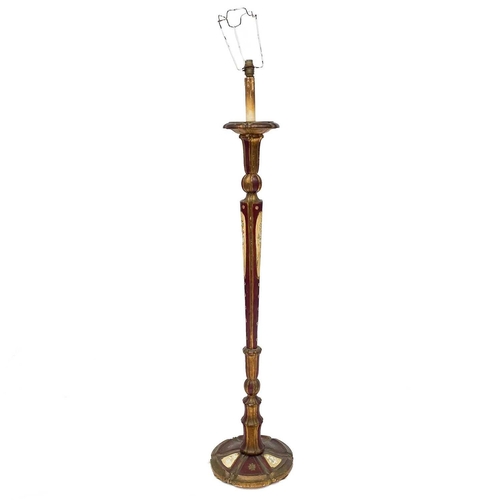 209 - A lacquered and gilt standard lamp. Height 140cm.