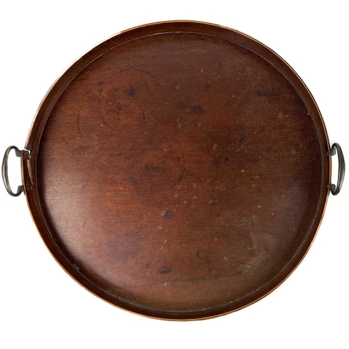 221 - A 19th century circular mahogany tray. With twin brass handles, diameter 47cm, together with two mah... 