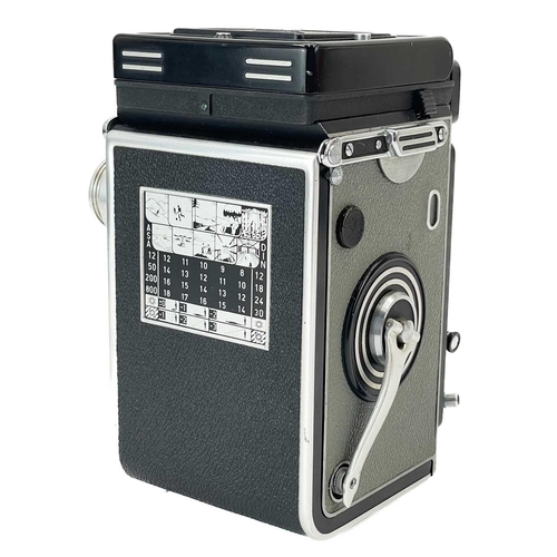 222 - A grey Rollieflex T model 1 TLR camera. Serial number 2137208, a Carl Zeiss Tessar 75mm, in original... 