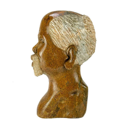 226 - A large African Shona stone bust. Height 41cm.