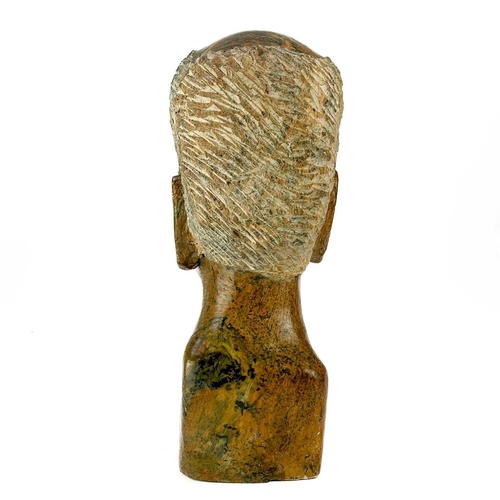 226 - A large African Shona stone bust. Height 41cm.