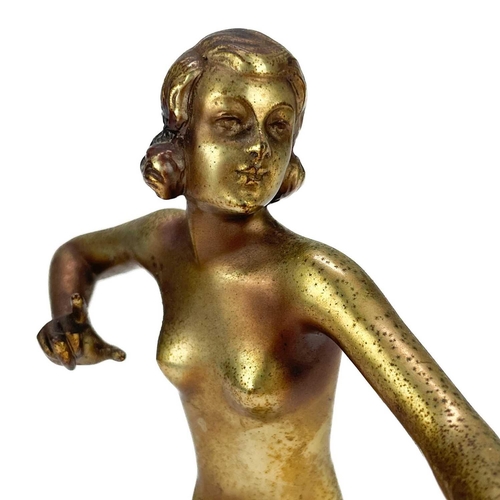 228 - Josef Lorenzl (Austrian, 1892-1950), an Art Deco gilt bronze figure. Of a naked female dancer, signe... 