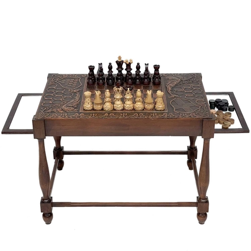 229 - A Cornwall theme chess table. With twin slide out mirrored leaves on turned supports and chamfered s... 