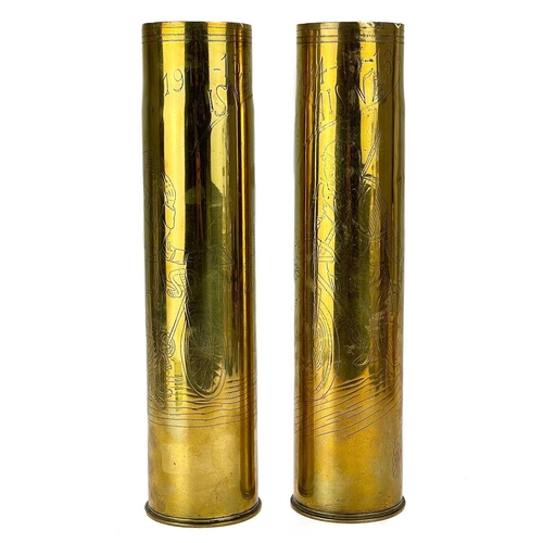 238 - Trench art and Bicycle interest shell cases. A pair of WW I brass shell cases, one engraved with a F... 