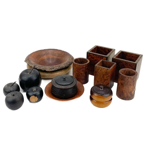 24 - 20th century treen. A box of turned bowls, a turned lignum vitae apple box, and cover and other simi... 