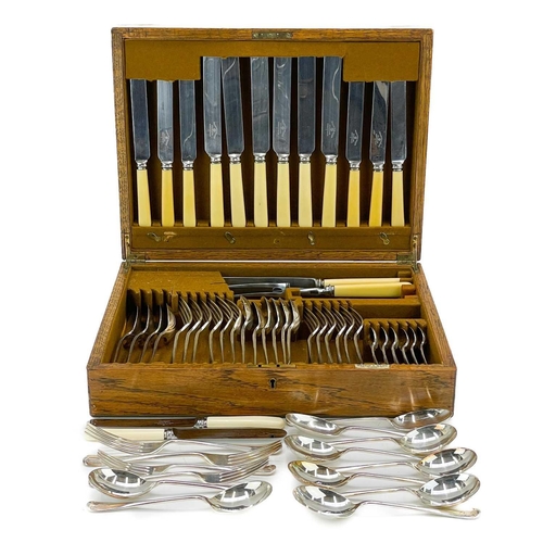 241 - A Mappin & Webb oak cased canteen. Together with other Mappin & Webb cutlery.