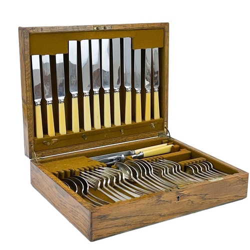 241 - A Mappin & Webb oak cased canteen. Together with other Mappin & Webb cutlery.