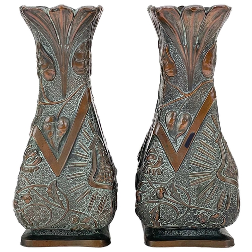 246 - A pair of Japanese antimony Art Nouveau style vases. Height 15cm.