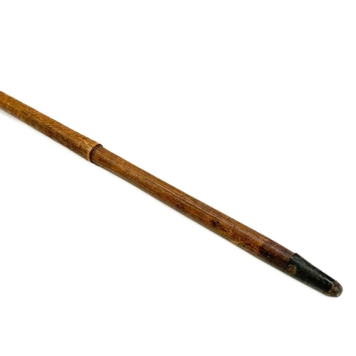 279 - A Bamboo sword stick. 19th century, with a foliate engraved tapered blade, length 94.5cm.