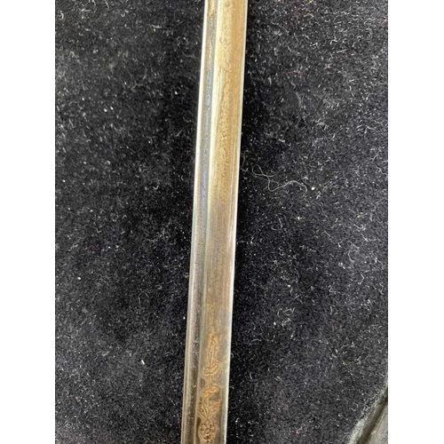 279 - A Bamboo sword stick. 19th century, with a foliate engraved tapered blade, length 94.5cm.