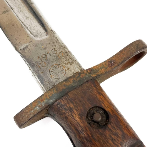 280 - A United States Remington bayonet. Blade marked at base with 1913 - 10 17, the leather case marked H... 