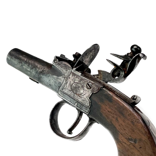 286 - A flintlock pocket pistol. (lacks safety catch) with engraved decoration and mahogany grip with inse... 