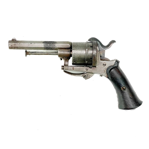 287 - A French or Belgian pin fire six shot revolver. With mahogany grip and folding trigger, Length 19cm.