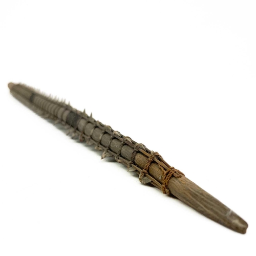 294 - A Kiribati (Gilbert Islands) shark tooth sword. Late 19th/early 20th century, with fibre bound taper... 