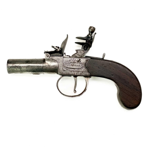 297 - A Flintlock pocket pistol signed Pritchard. With mahogany grip, length 16cm.