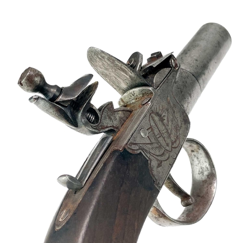 297 - A Flintlock pocket pistol signed Pritchard. With mahogany grip, length 16cm.