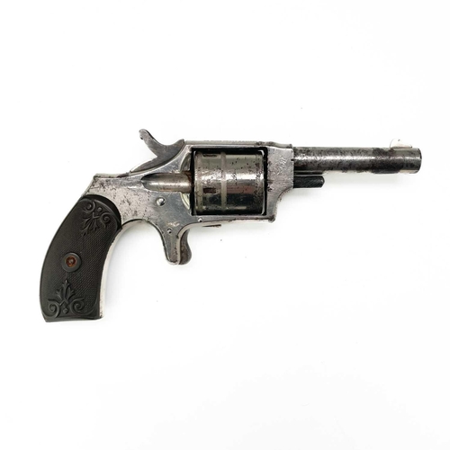 298 - A Hopkins & Allen Dictator rim fire revolver. With chequered and scroll decorated bakelite grip, Len... 