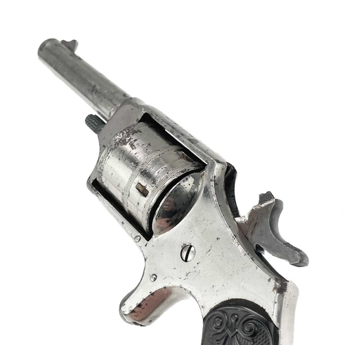 298 - A Hopkins & Allen Dictator rim fire revolver. With chequered and scroll decorated bakelite grip, Len... 