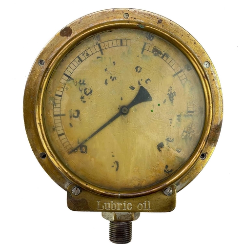 30 - A brass Dewrance & Co London pressure gauge. Diameter 18cm, another early 20th century gauge, and tw... 