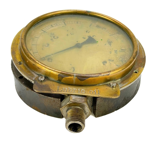 30 - A brass Dewrance & Co London pressure gauge. Diameter 18cm, another early 20th century gauge, and tw... 